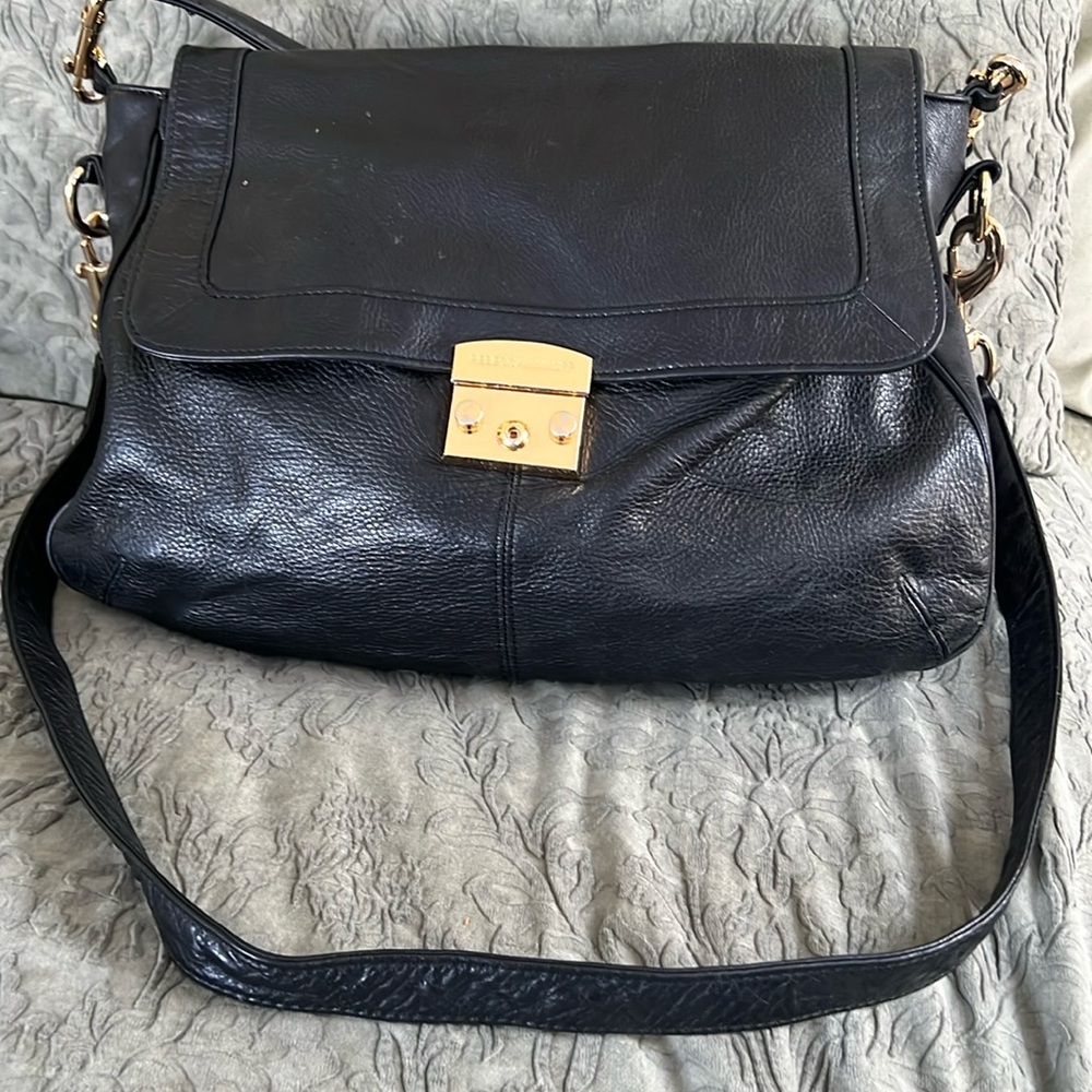 Gently worn bag Gold hardware open tag show wear.Will add close up picture